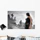 Long black haired woman in a misty cemetery Wall Mural