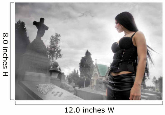 Long black haired woman in a misty cemetery Wall Mural