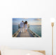 Sensual happy lovers in white clothes on the beach (Maldives) Wall Mural