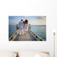 Sensual happy lovers in white clothes on the beach (Maldives) Wall Mural