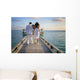 Sensual happy lovers in white clothes on the beach (Maldives) Wall Mural