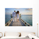 Sensual happy lovers in white clothes on the beach (Maldives) Wall Mural