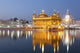Golden Temple illuminated at night Wall Mural