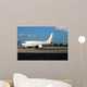 Boeing 737 passenger jet parked at terminal Wall Mural
