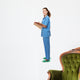 A full-length portrait of a female doctor Wall Decal