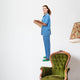 A full-length portrait of a female doctor Wall Decal