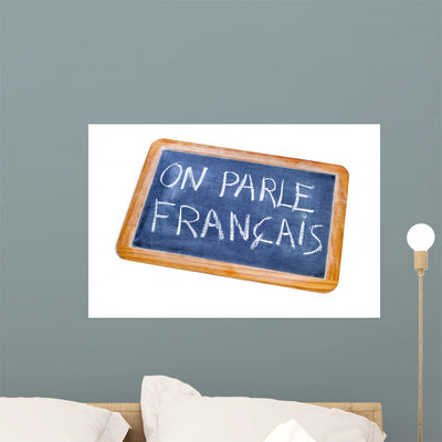 French Is Spoken Wall Decal shown on a wall