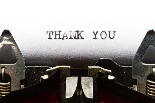 Typewriter with Text Thank