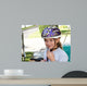 Cute Girl in a Helmet Is Going for a Ride Wall Mural