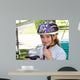 Cute Girl in a Helmet Is Going for a Ride Wall Mural