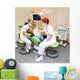 Dentist at work in dental room Wall Mural