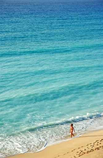 Woman Walking on the Beach Caribbean Wall Decal