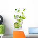 Fresh mojito drink with falling limes into glass Wall Decal