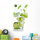 Fresh mojito drink with falling limes into glass Wall Decal