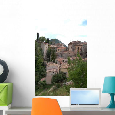 Medieval Hillside Town Wall Decal shown on a wall