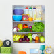 refrigerator full of healthy fruits, vegetables and dairy Wall Mural