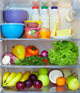 refrigerator full of healthy fruits, vegetables and dairy Wall Mural