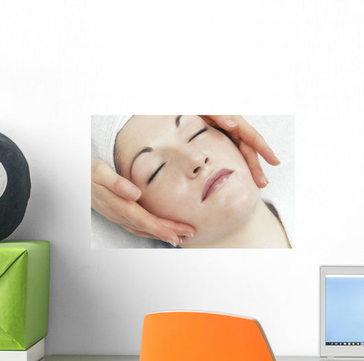 Woman Getting A Face Massage Wall Mural