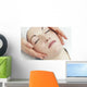 Woman Getting A Face Massage Wall Mural
