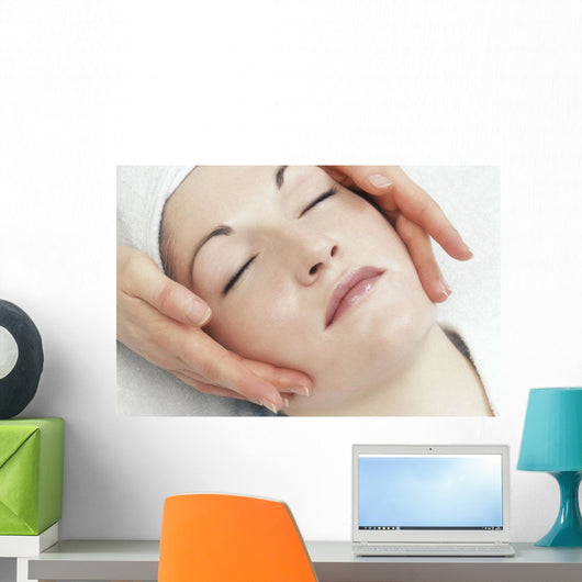 Woman Getting A Face Massage Wall Mural
