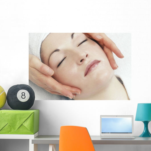 Woman Getting A Face Massage Wall Mural