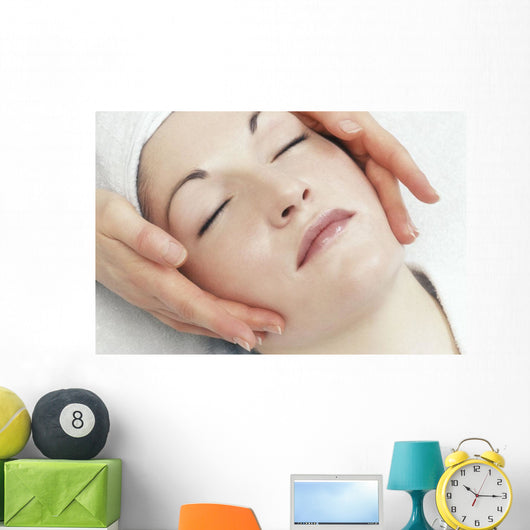 Woman Getting A Face Massage Wall Mural