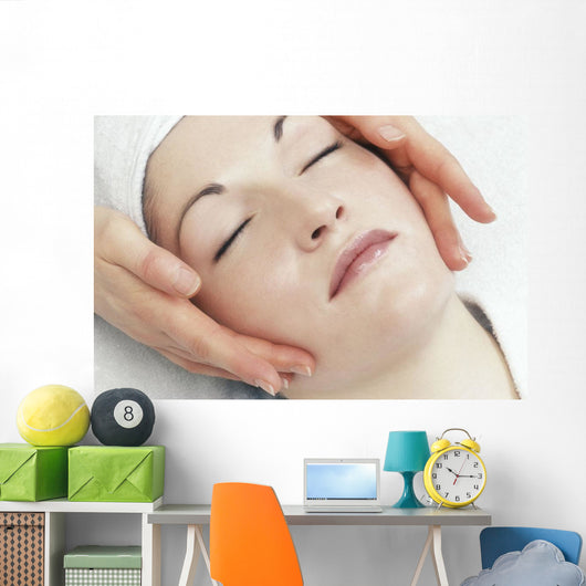 Woman Getting A Face Massage Wall Mural