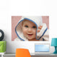 portrait of a baby with hood Wall Mural