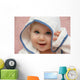 portrait of a baby with hood Wall Mural