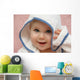 portrait of a baby with hood Wall Mural