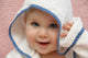 portrait of a baby with hood Wall Mural
