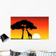 African Sunset background with giraffe Wall Mural