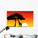 African Sunset background with giraffe Wall Mural
