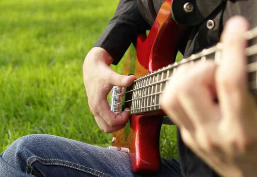 Teenage Boy Playing Bass Wall Decal