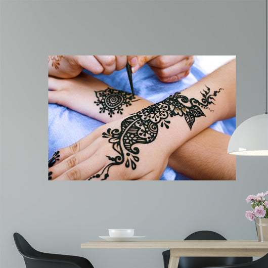 Henna Being Applied to Wall Decal