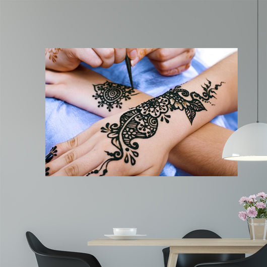 Henna Being Applied to Wall Decal
