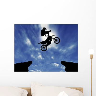 Silhouette Motorcycle Jump Wall Decal shown on a wall