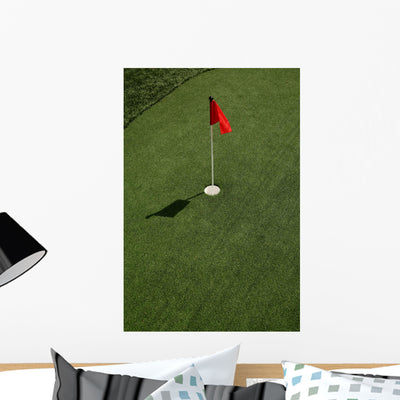 Red Flag Putting Green Wall Decal shown on a wall