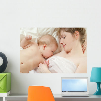 Breastfeeding Laying Down Wall Decal shown on a wall