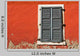 Red Wall and Shuttered Window Wall Decal