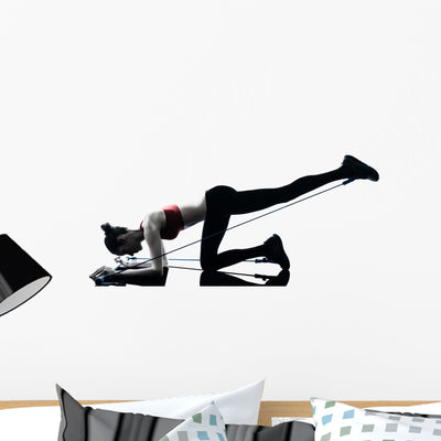 Woman Exercising with Gymstick - Leg Extension Wall Decal shown on a wall