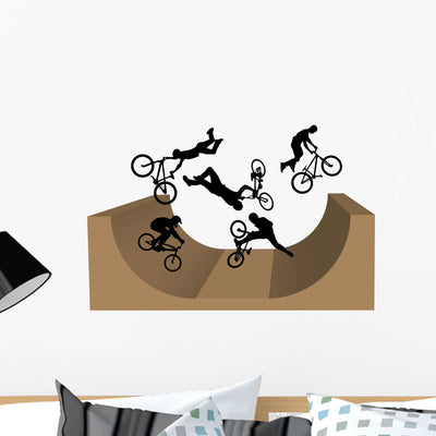 Cycling BMX Silhouette Wall Decal shown on a wall