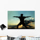 Silhouette of Man Practicing Yoga Wall Mural