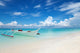 White Boat Tropical Beach