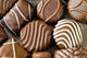 Chocolate candies closeup Wall Mural