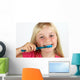 Girl brushing her teeth Wall Decal