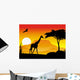 beauty silhouette of giraffe with sunset background Wall Mural