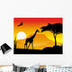 beauty silhouette of giraffe with sunset background Wall Mural
