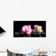 Spa stones with orchid flower and candles isolated on black Wall Mural