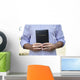 Man Holding Black Bible